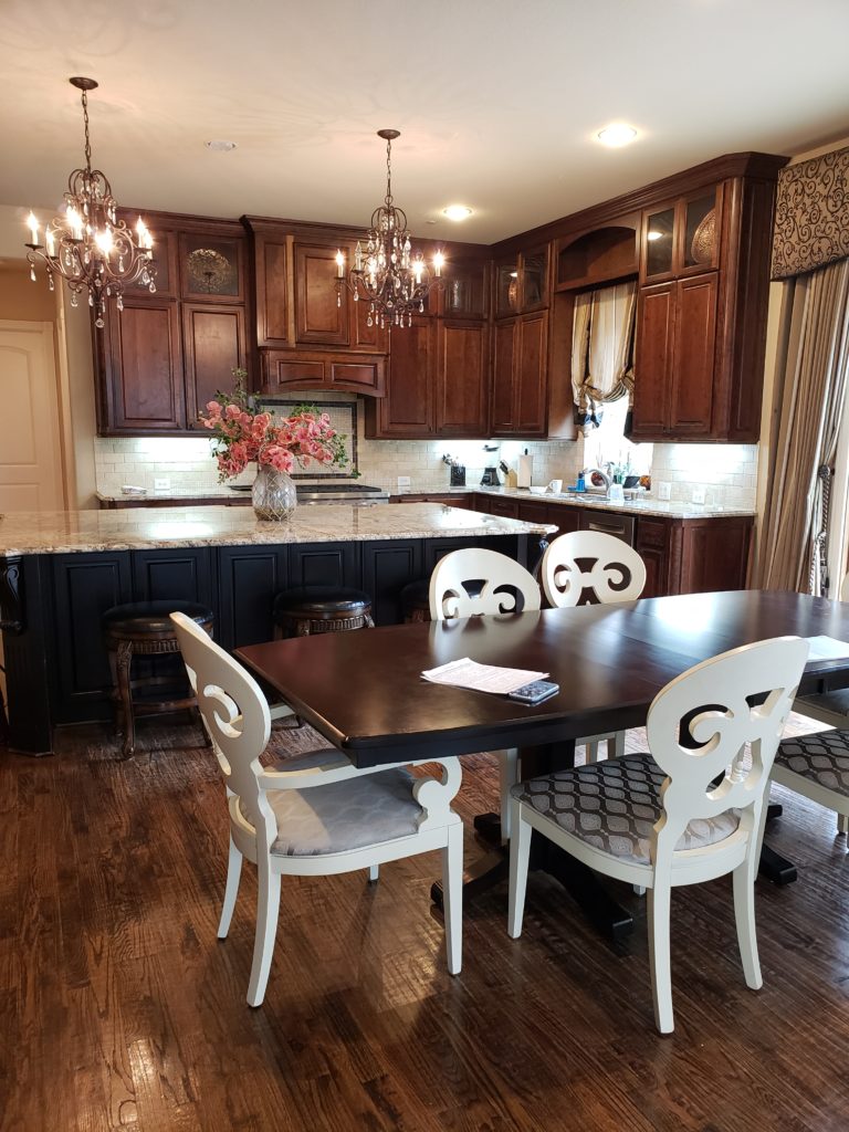 Dark Stained Kitchen Cabinets With White Dining Room Furniture